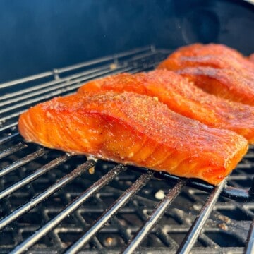 Salmon smoking on the top rack of a pit boss pellet grill