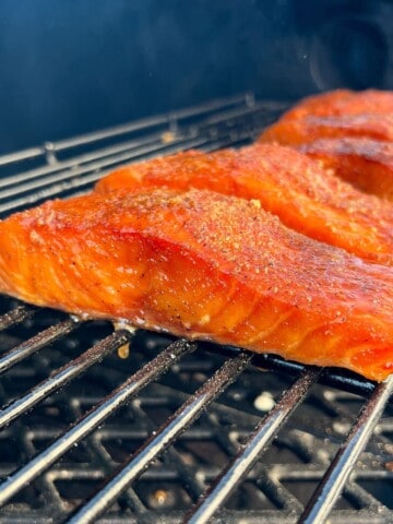 Salmon smoking on the top rack of a pit boss pellet grill