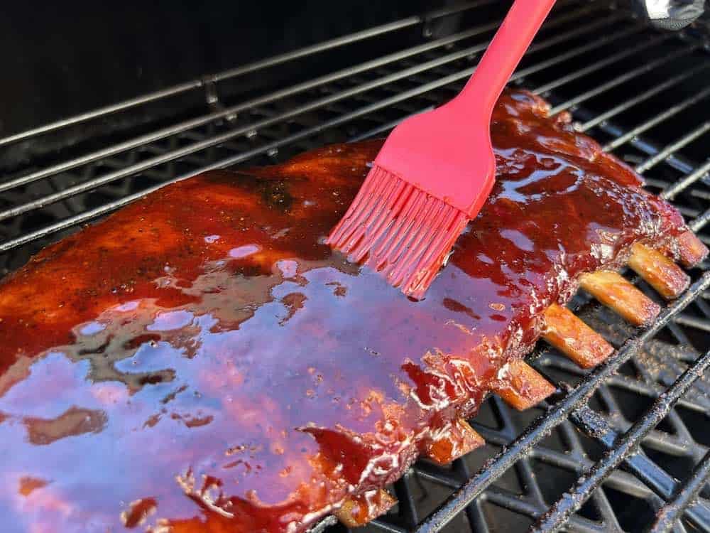 Brushing BBQ Sauce Spareribs Pit Boss