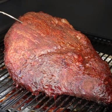 a smoked beef brisket on a camp chef pellet grill