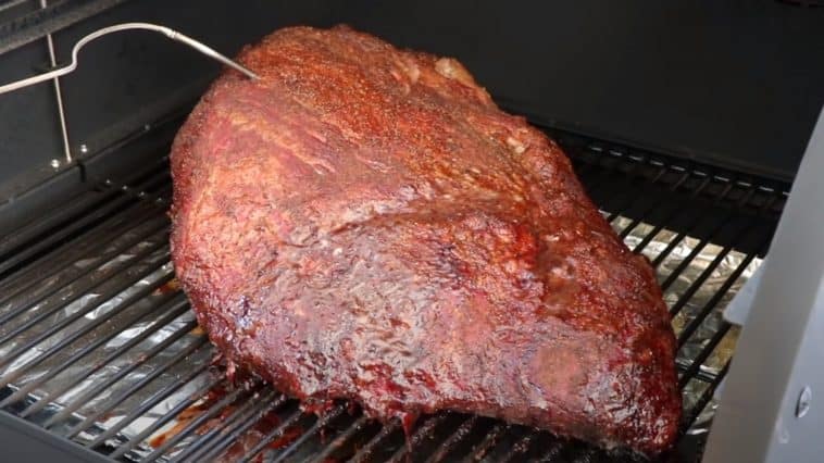 a smoked beef brisket on a camp chef pellet grill