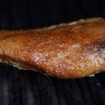 a smoked tuna steak on a grill