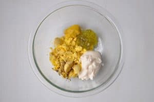 smoked deviled egg ingredients in a bowl