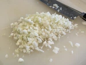 diced onion on a cutting board