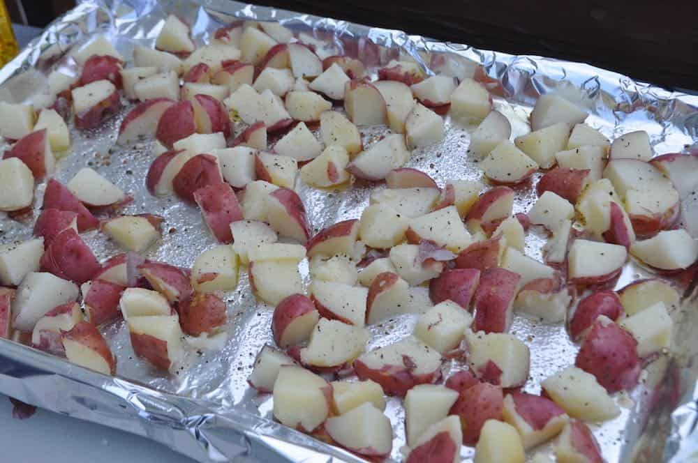 potatoes diced on a pan to smoke