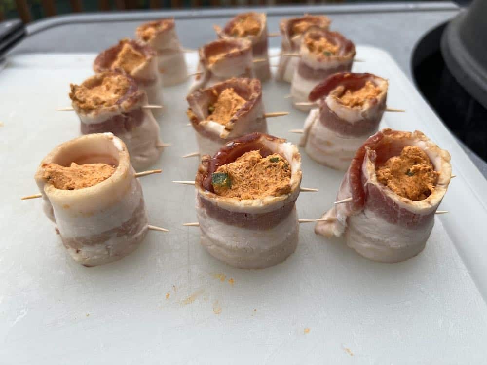 filled raw pig shots on a cutting board