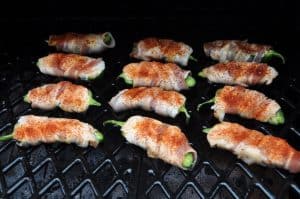 jalapeno poppers smoking on a pellet grill