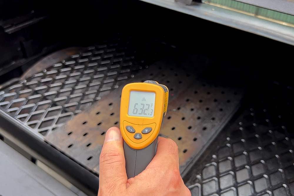 infrared thermometer measuring grill grates to 632 degrees