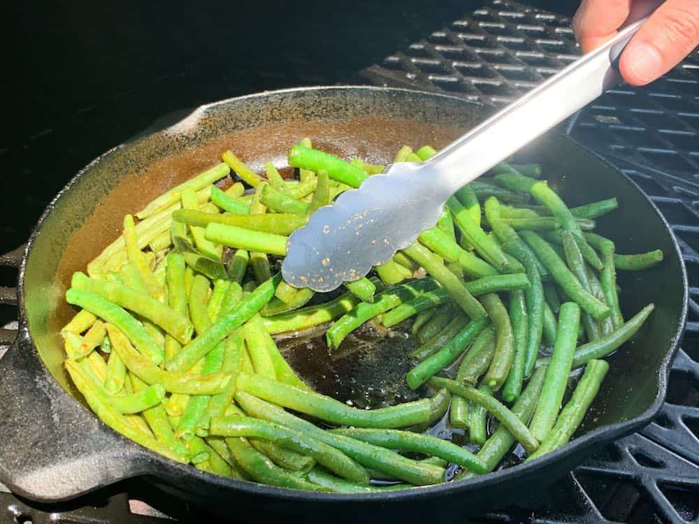 tossing smoked green beans