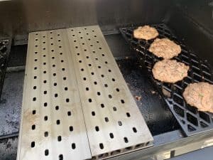 hot grill grates next to smoked turkey burgers