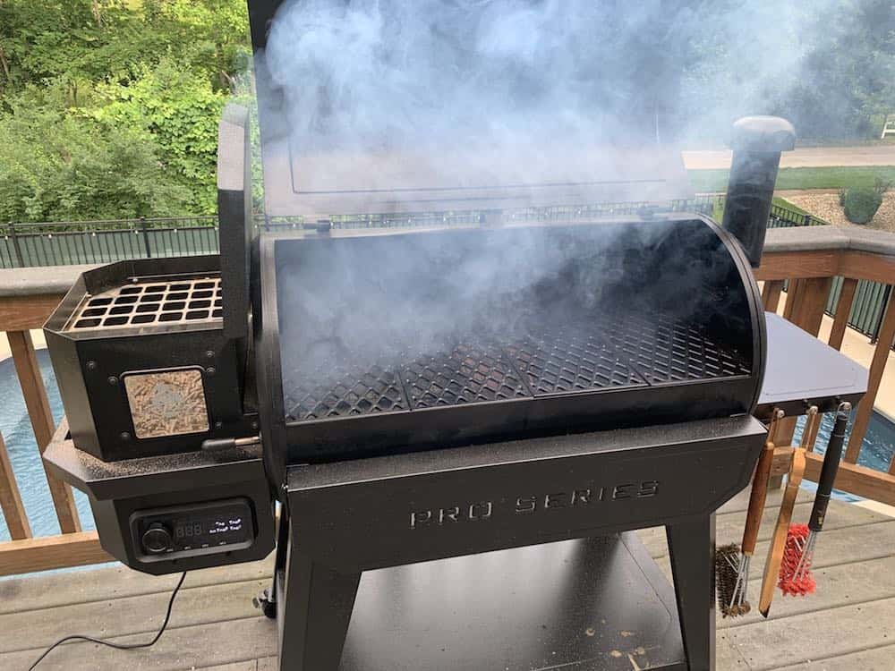 a pellet grill making white smoke
