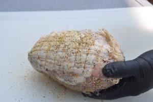 seasoning a raw boneless turkey breast