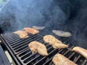 chicken tenders smoking on a pellet grill