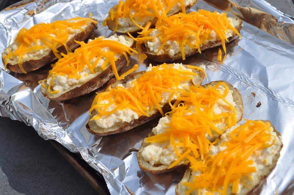twice baked potatoes on a tray before smoking