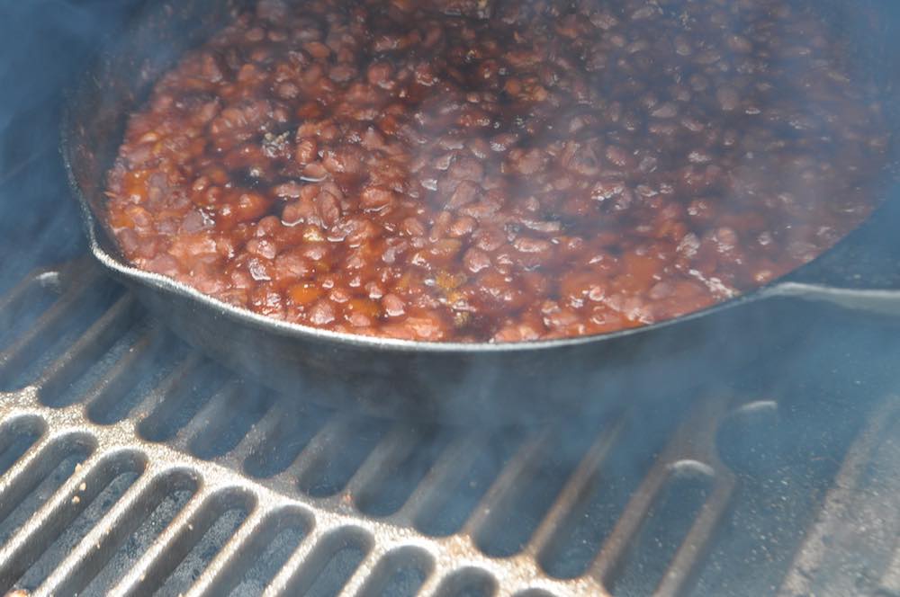 smoked baked beans in a traeger pellet grill
