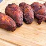 masterbuilt electric smoker smoked chicken breasts on a cutting board
