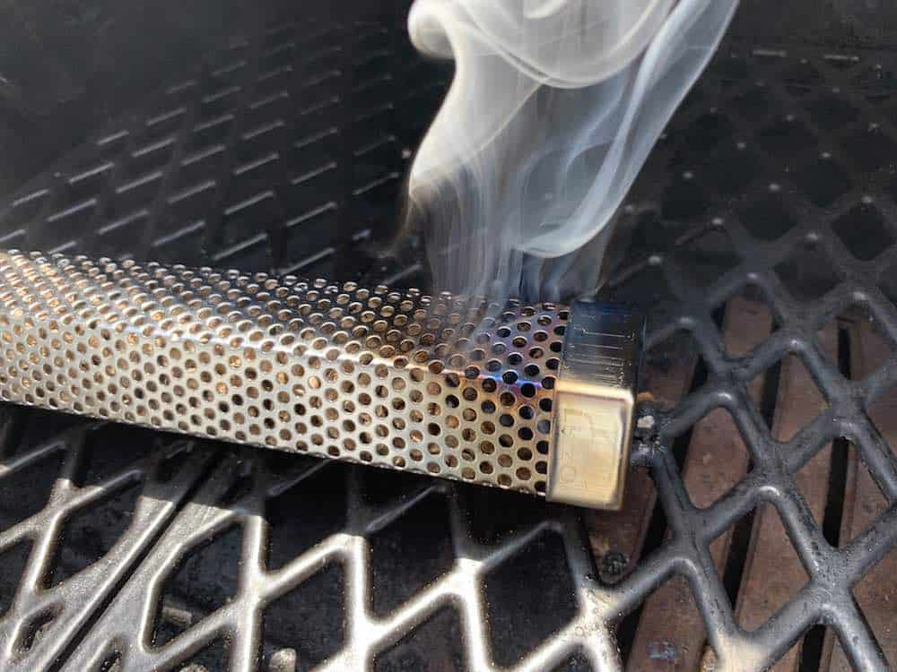 a pellet tube smoker making smoke