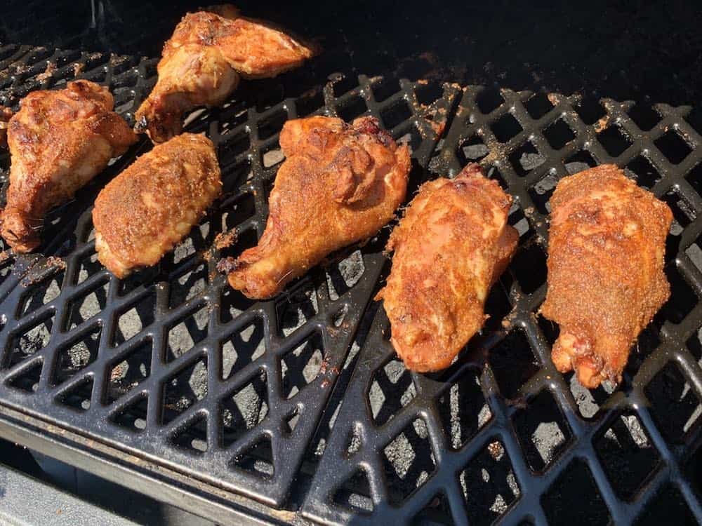 smoked turkey wings on a grill