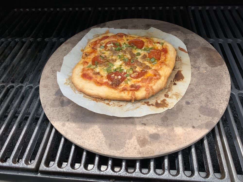 smoking a pizza on a pizza stone in a smoker