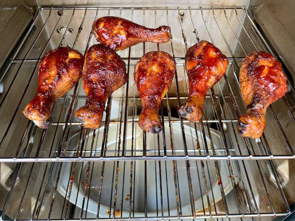 smoked chicken legs in an electric smoker