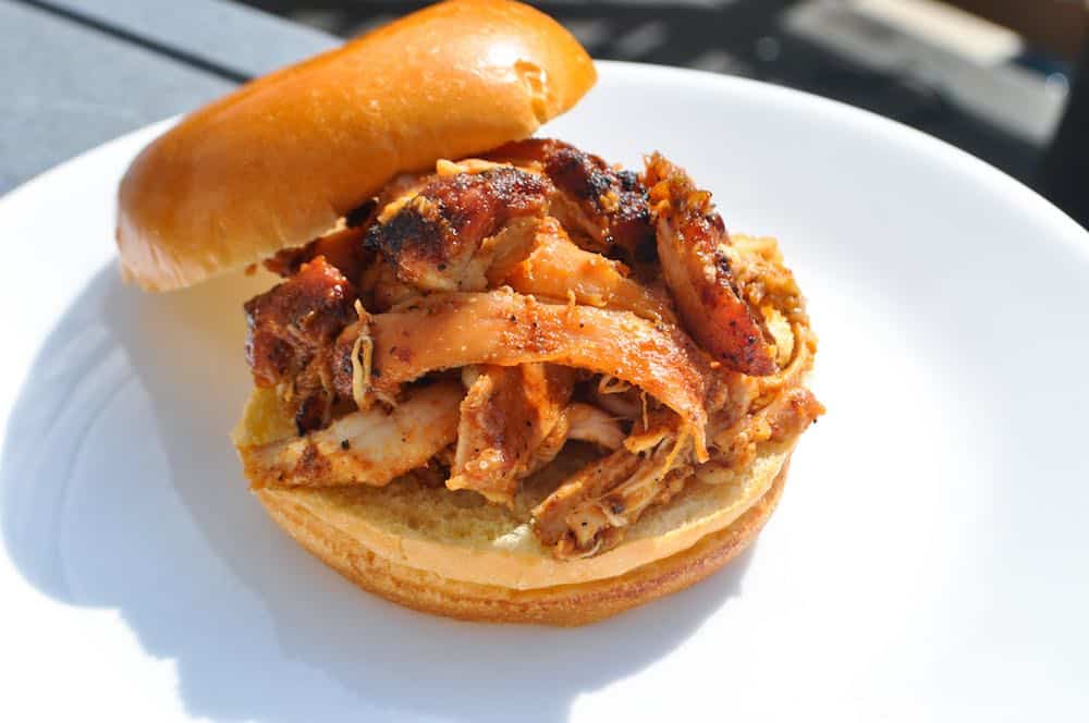 smoked pulled chicken on a sandwich