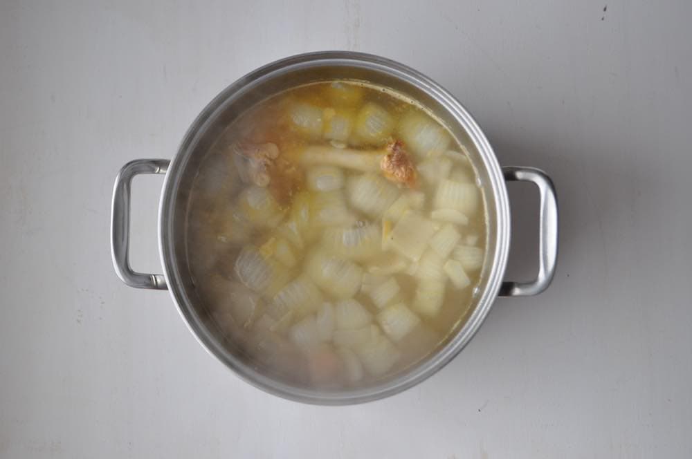 a pot of smoked turkey soup stock