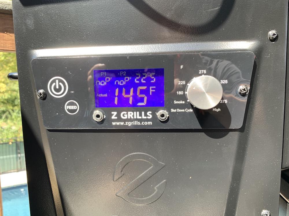 a z grills pellet grill control panel reading 145 degrees F actual temperature and set to 225 degrees
