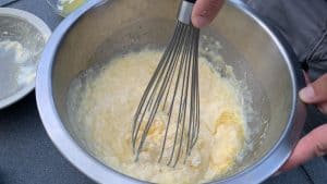 whisking smoked cornbread batter