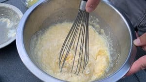 whisking smoked cornbread batter