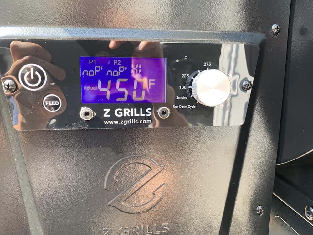 a z grills pellet grill control panel showing 450 degrees F on the HIGH setting