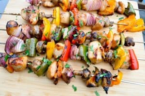 smoked chicken kabob skewers on a cutting board