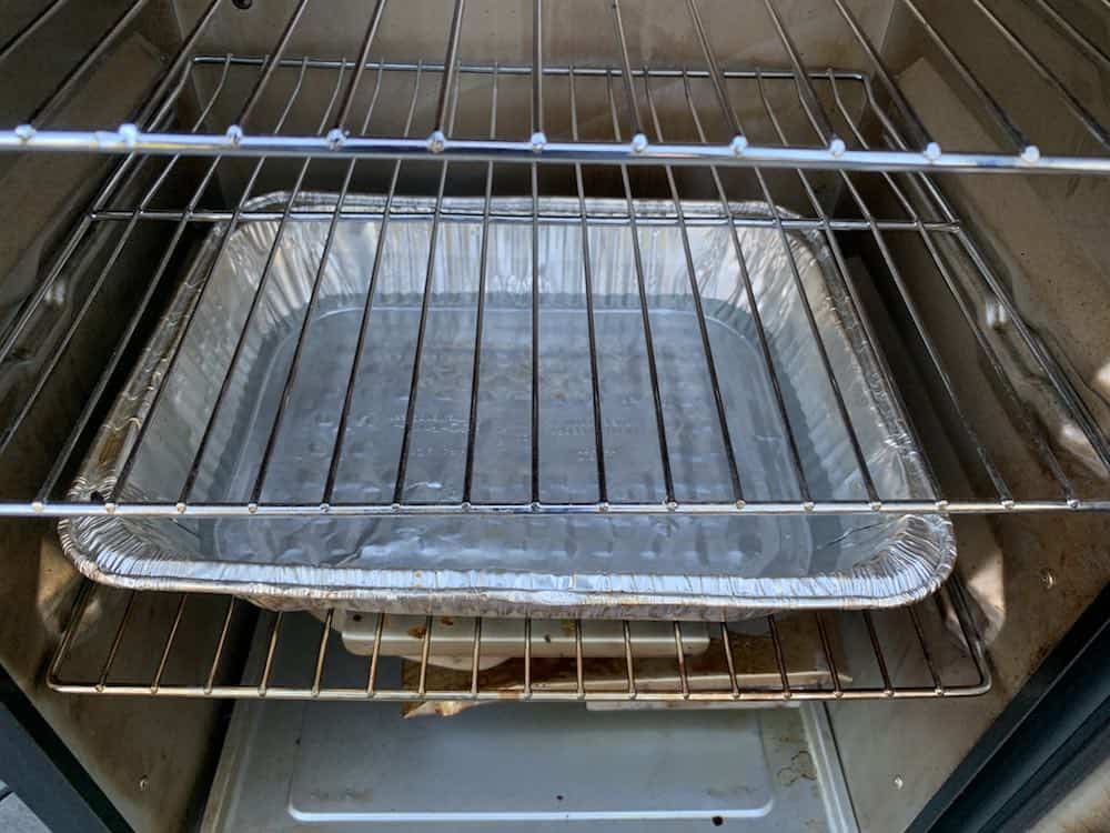 a disposable water pan in a masterbuilt electric smoker