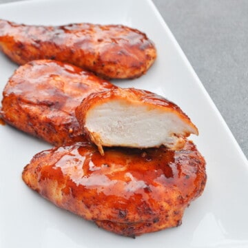 traeger smoked chicken breasts on a white plate