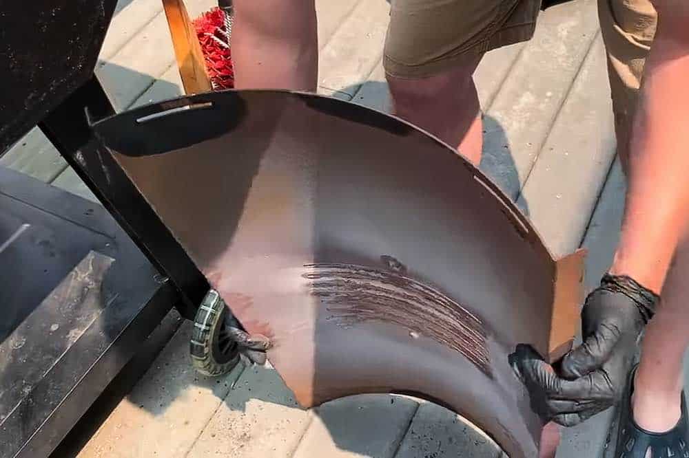 Pit Boss Flame Broiler Plate underside to show edge is curved