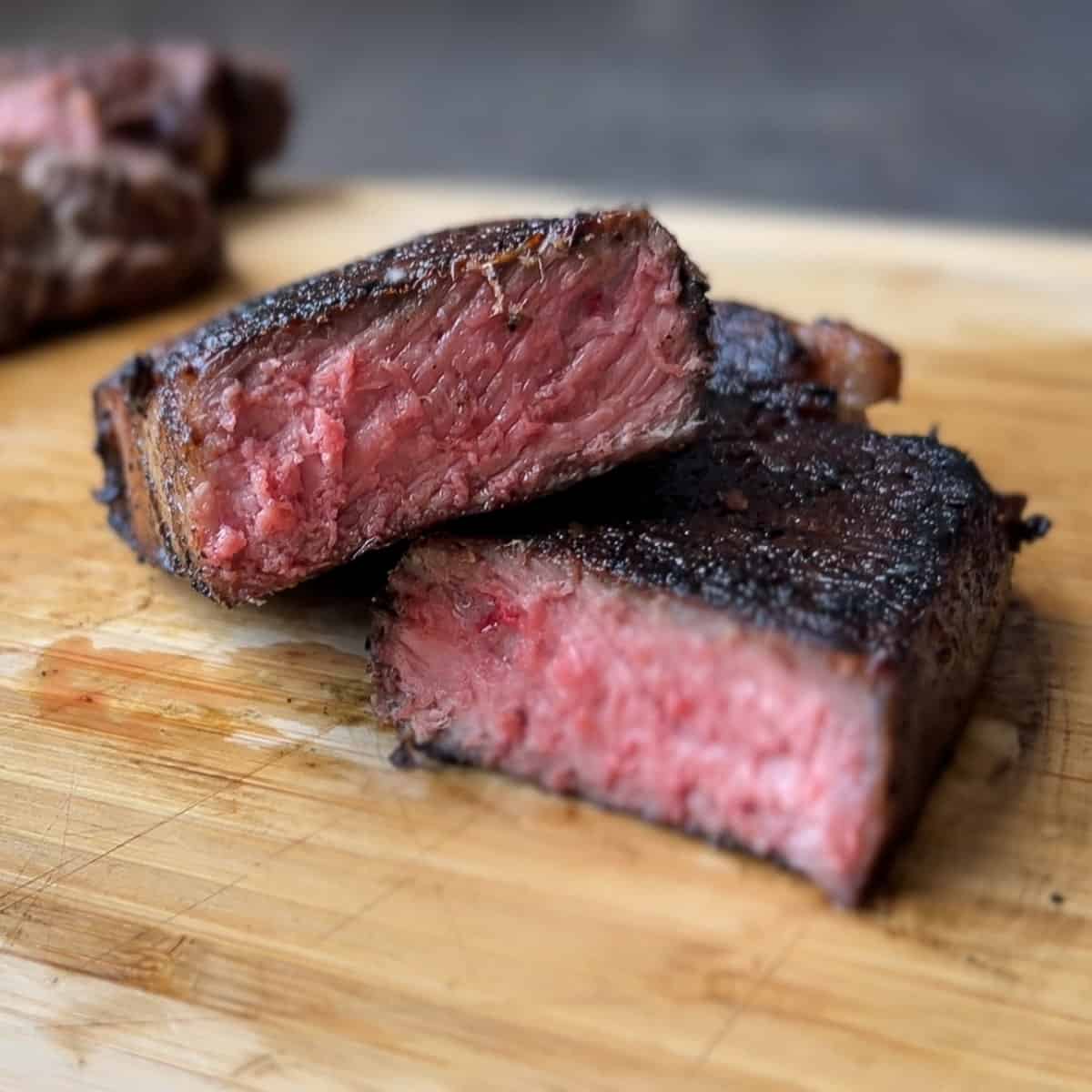 Cut open steak on a cutting board