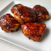Traeger Smoked Chicken Thighs on a white plate