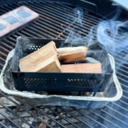 firebox filled with wood in an aluminum foil loaf pan
