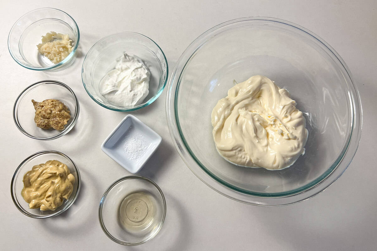 all ingredients for horseradish cream sauce in individual bowls and dishes