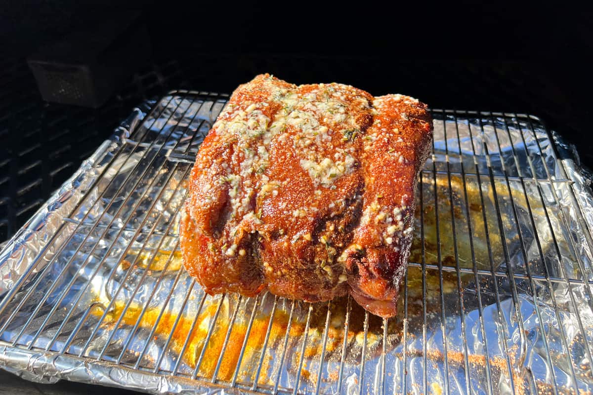 a smoked ribeye roast with garlic herb butter