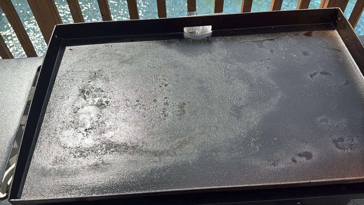 the surface of a Blackstone griddle that has been scraped