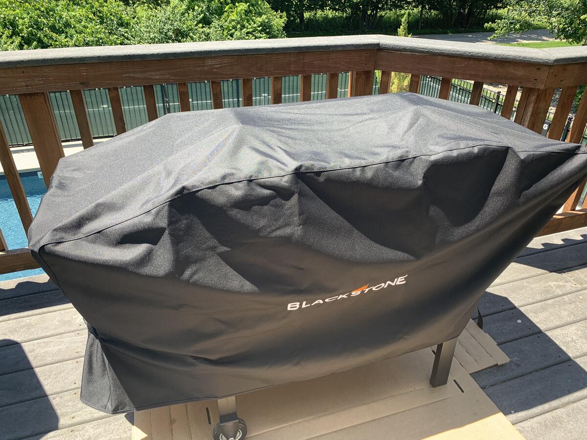 a Blackstone griddle covered with a soft cover