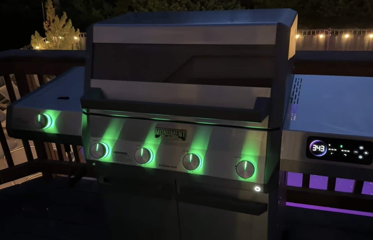 LED-lit outdoor grill for backyard cooking.